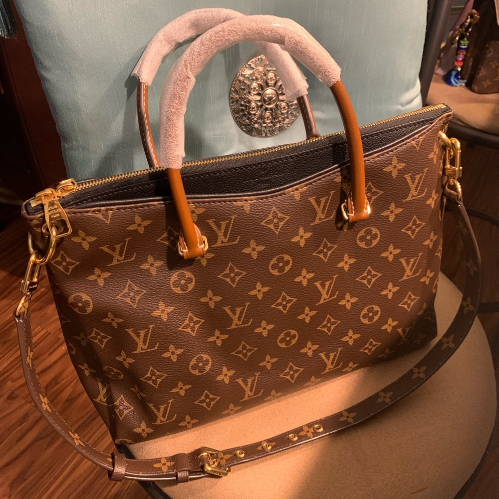 Louis Vuitton Monogram Pallas Noir bag.